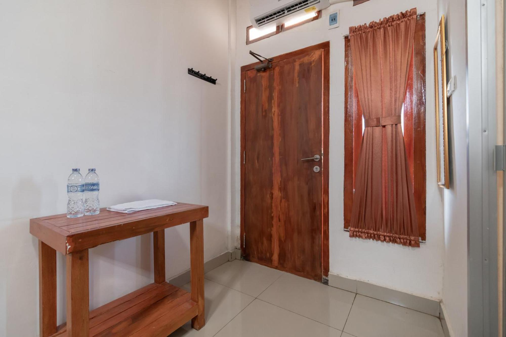 RedDoorz Syariah near Jakabaring Sport City Palembang Bagian luar foto